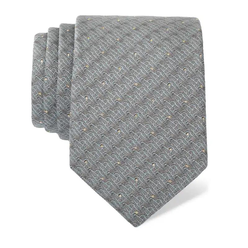 Kravata CROATA AuHRum Tematski Limitirana serija Glagoljica Siva  Svila 93%, Metalizirano vl. (zlato) limited 7%  